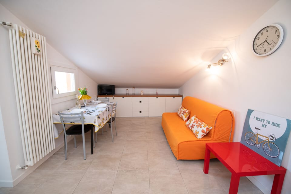 Basic Apartment | Living area | 50-inch TV with cable channels