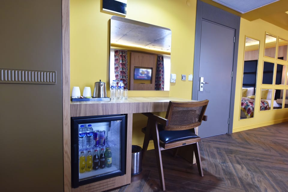 Deluxe Triple Room | Premium bedding, in-room safe, laptop workspace, blackout drapes
