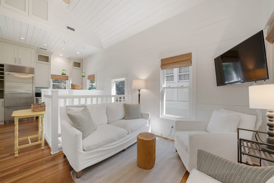 SECOND STORY LIVING AREA FACING KITCHEN