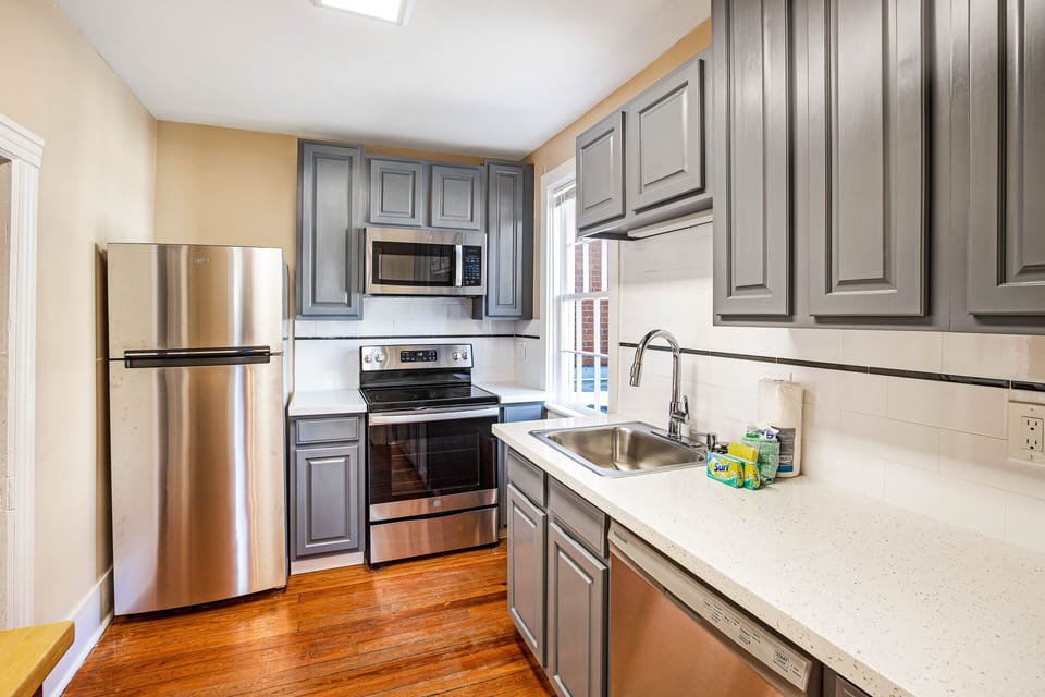 Just off of the living space, you'll find the completely renovated kitchen with stainless steel appliances.