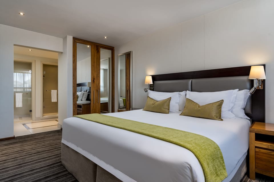 Suite, 1 King Bed | Hypo-allergenic bedding, minibar, in-room safe, desk