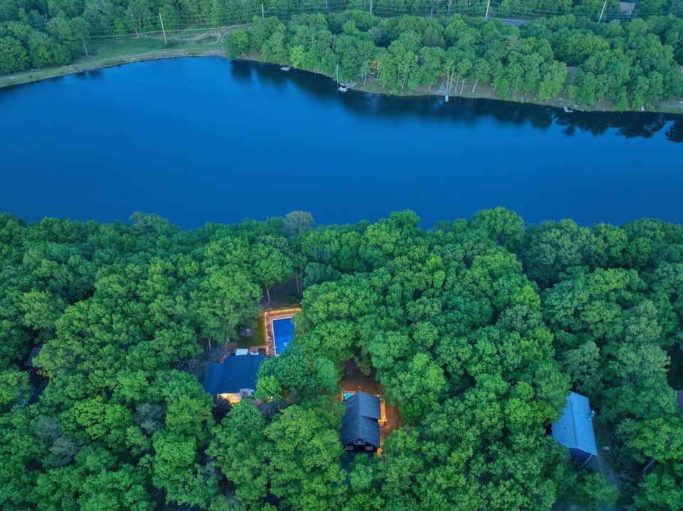 Enjoy serene lake views and the peaceful seclusion of our hidden lakefront home.