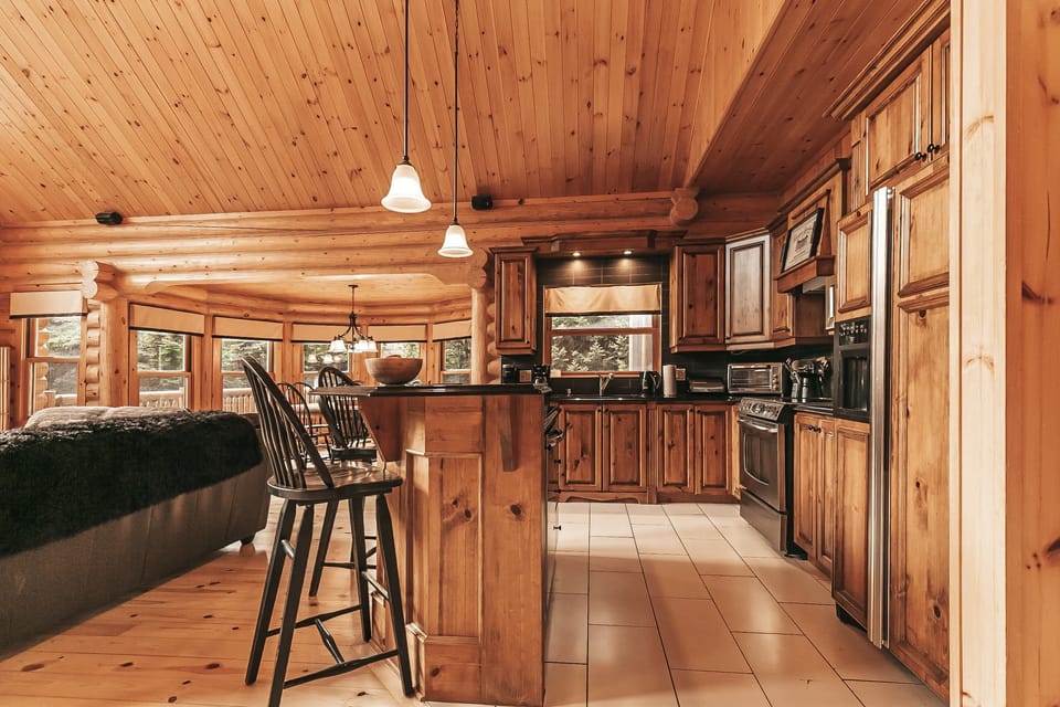 Kitchen area with island seating and ample storage