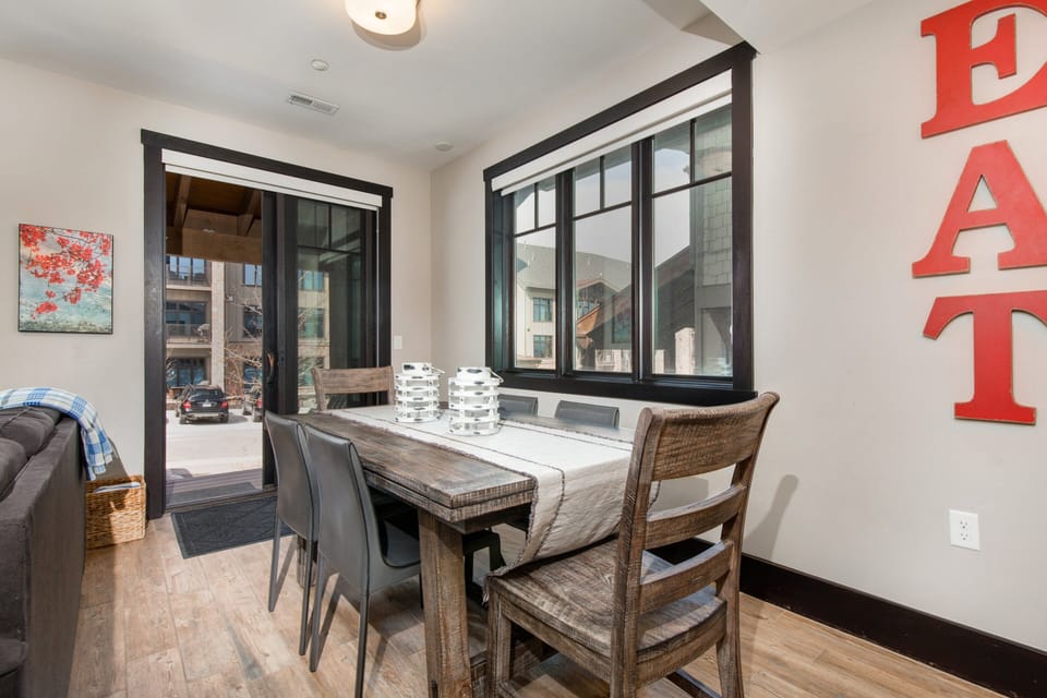 Dining Area with seating for six and private patio access