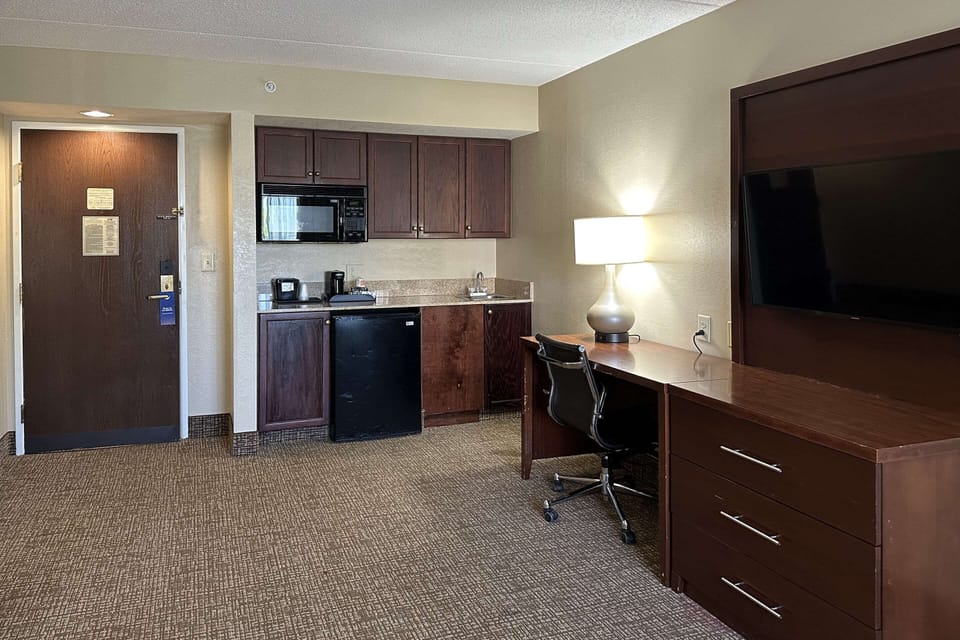 Down comforters, desk, blackout drapes, iron/ironing board