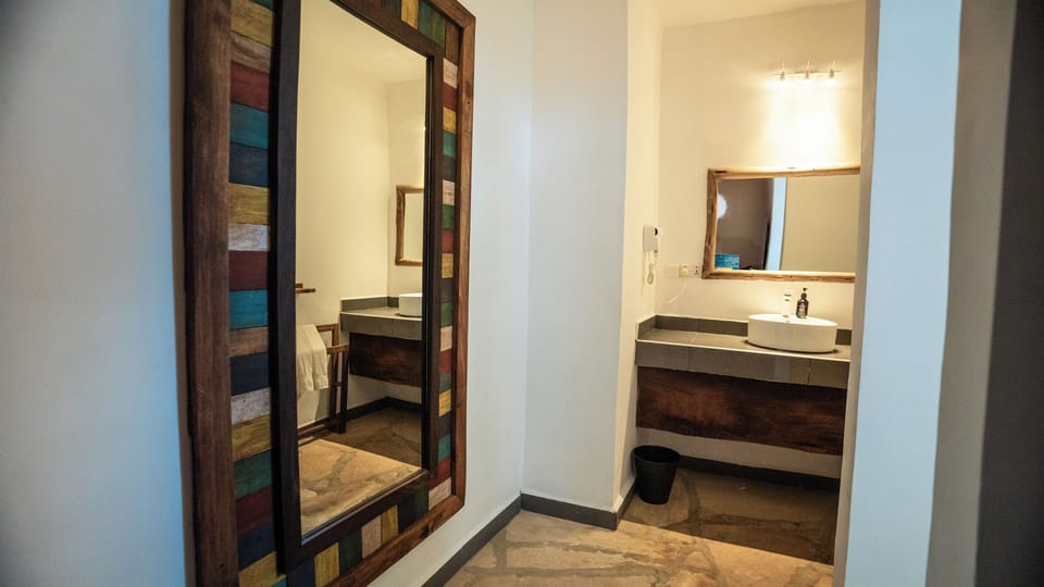 Suite, 1 Bedroom, Pool View | Bathroom | Shower, free toiletries, hair dryer, towels