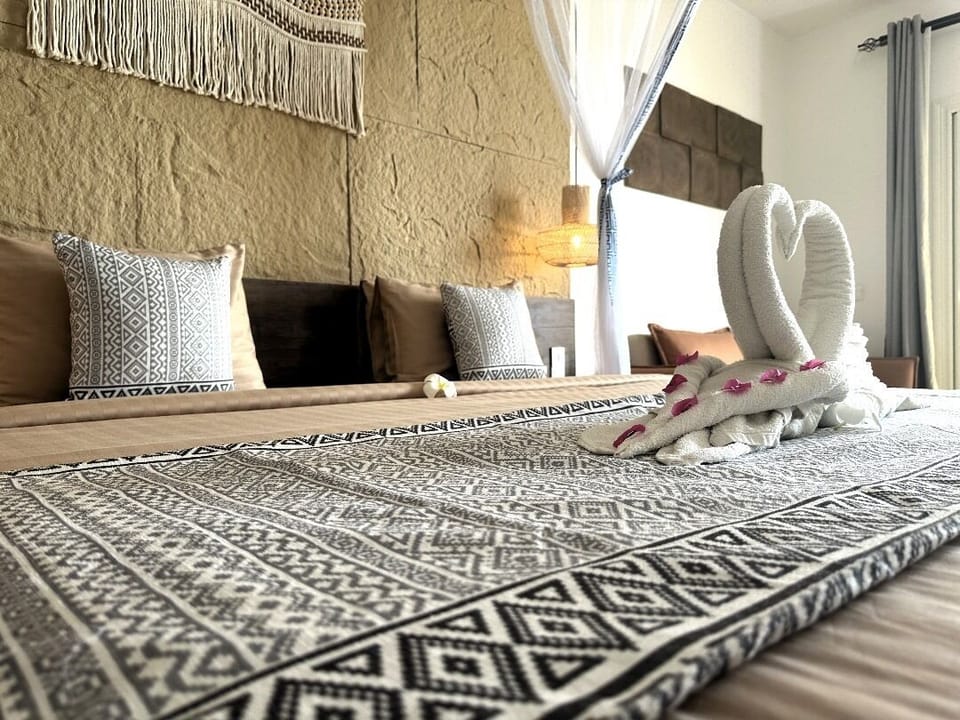 Down comforters, memory foam beds, in-room safe, desk