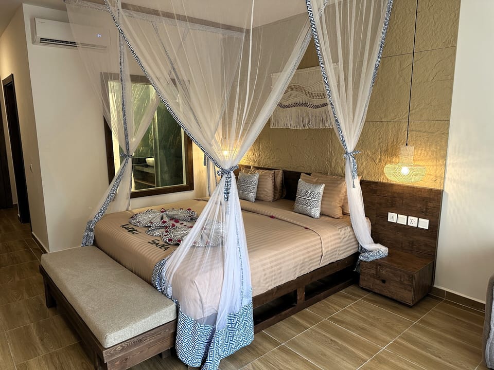Down comforters, memory foam beds, in-room safe, desk