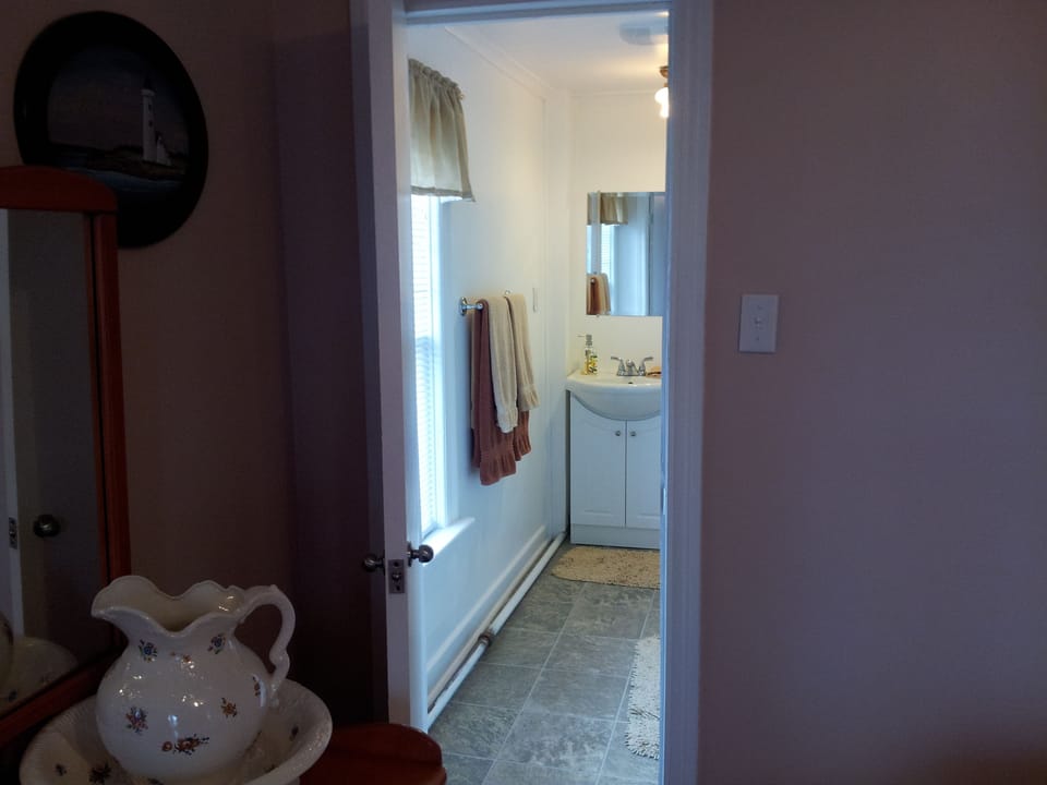 The Lighthouse, 1 Queen Bed, Ensuite Private Bathroom | Bathroom | Free toiletries, hair dryer, slippers, towels