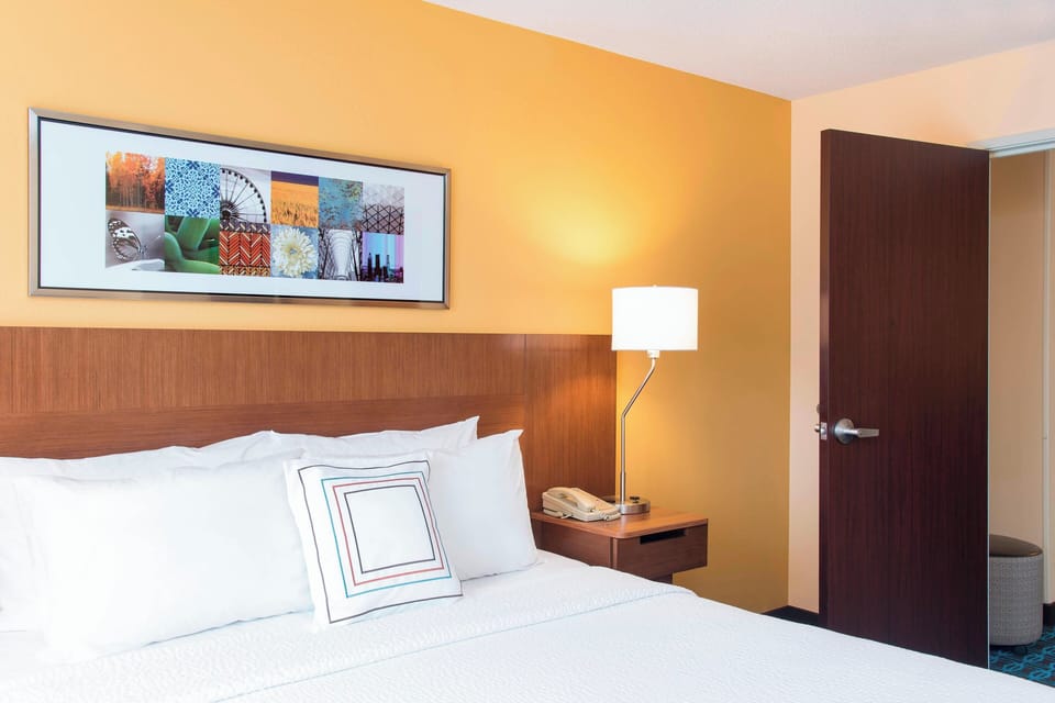 Suite, 1 Bedroom | Desk, blackout drapes, iron/ironing board, free cribs/infant beds