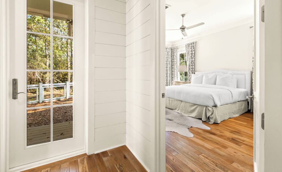 Step into your serene bedroom retreat with this first floor deluxe suite
