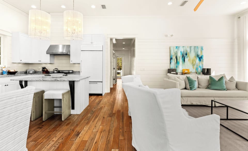 The main living area flows into the dining area and kitchen