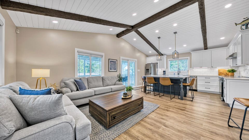 Open concept gathering area with mounted smart TV. (second floor)