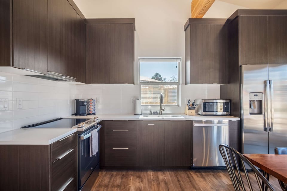 Cook like you're home at Timber + Tin B. The kitchen is stocked with everything you need to whip up your favorite meals.