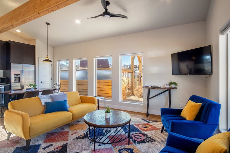 Step into comfort at Timber + Tin B! This inviting living room welcomes you to your private Kanab retreat.