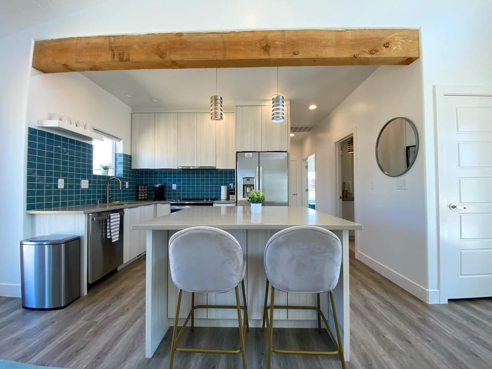 Sip a drink at the counter bar and enjoy the sights and smells of dinner cooking.