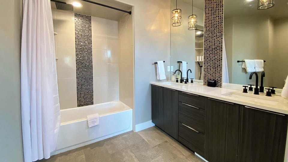 Ample space to get ready - the master ensuite bathroom boasts a double vanity.