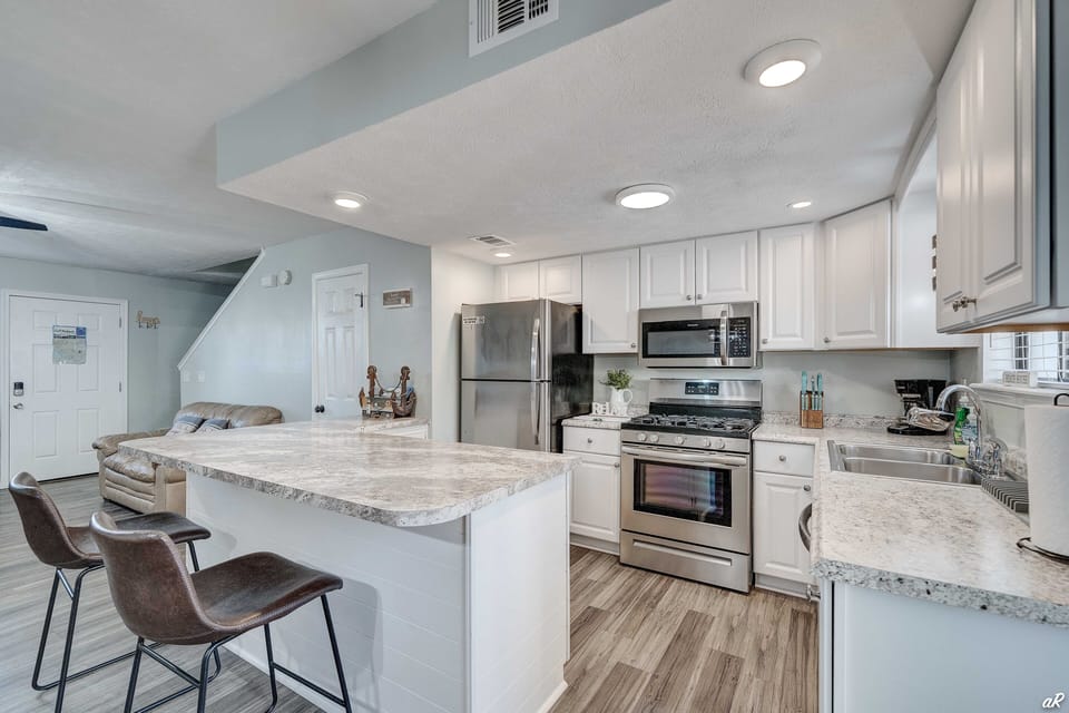 Kitchen with new cabinets and new appliances.