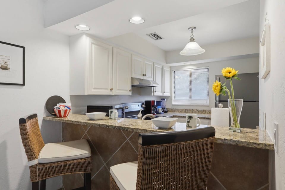 Bright kitchen with modern appliances and everything needed for an extended stay.