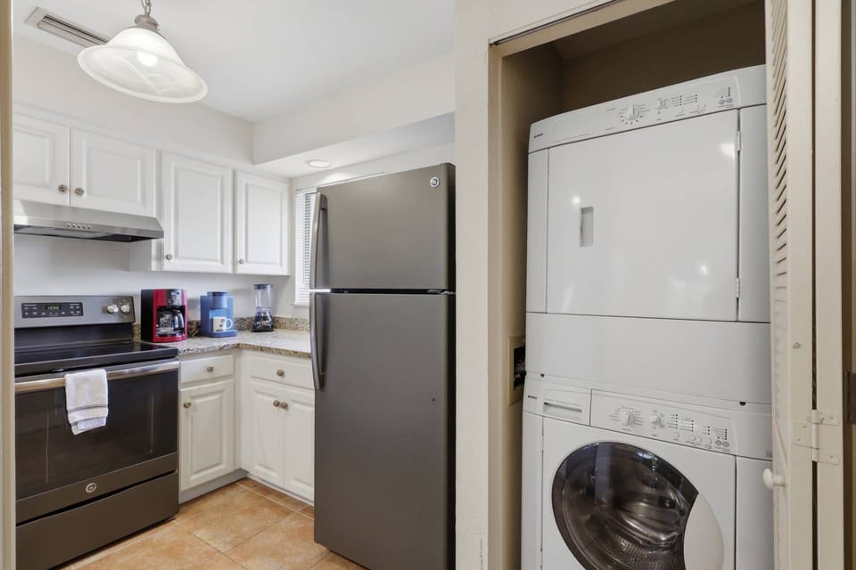 In-unit washer and dryer for added comfort during beach trips and longer stays.