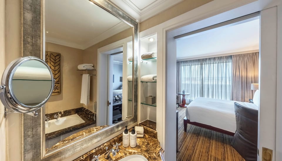 Separate tub and shower, deep soaking tub, eco-friendly toiletries