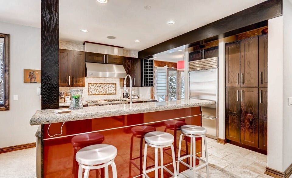 Kitchen - Fully Stocked Kitchen with Island and Seating for Three