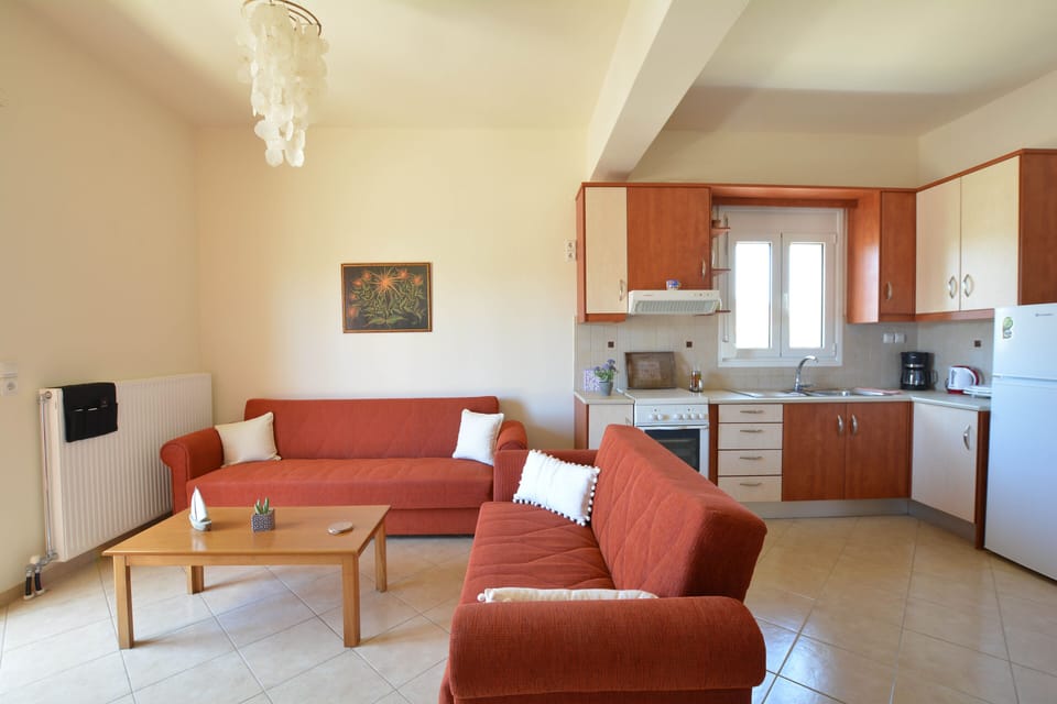 Panoramic Apartment | Living area | Flat-screen TV