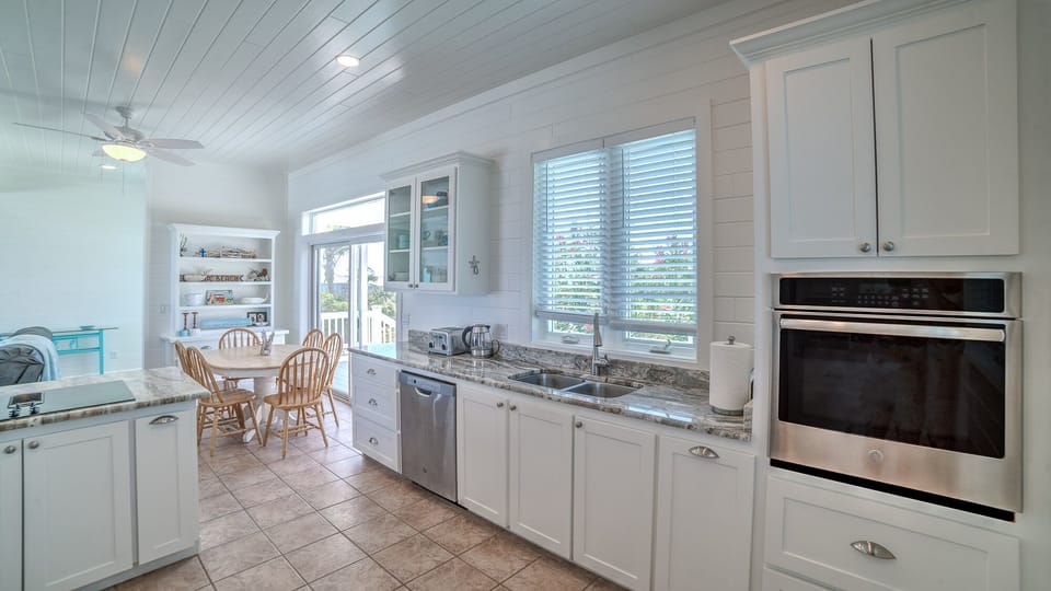 Breakfast area adjoining the fresh, new kitchen 
