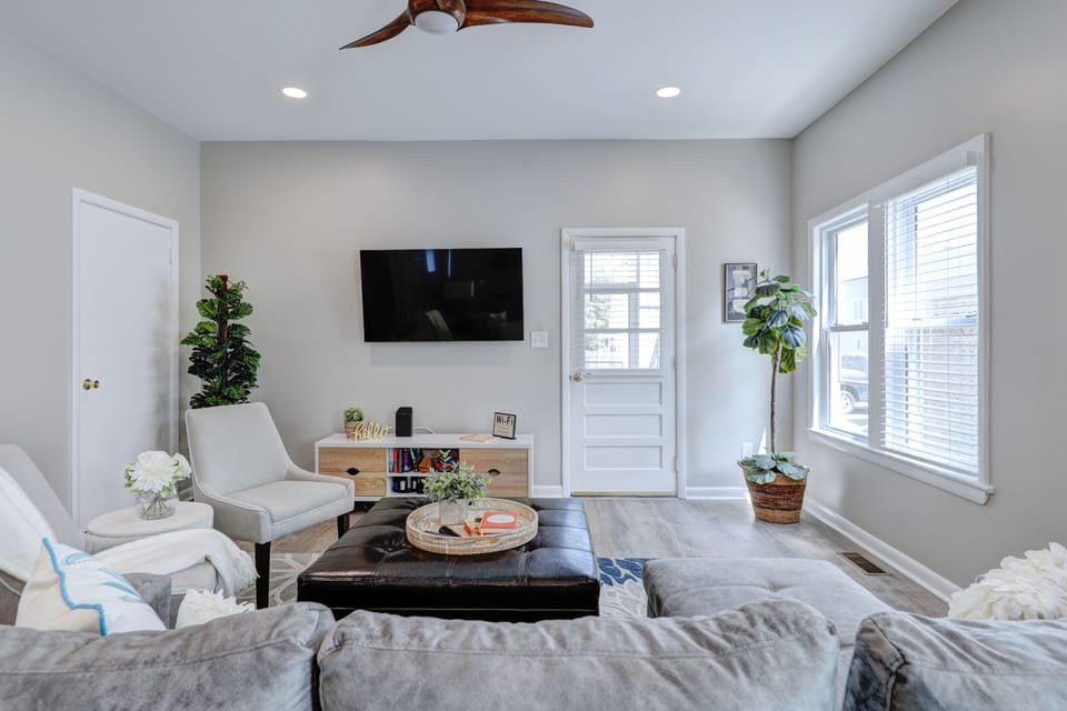 Family room with a large flat screen smart TV