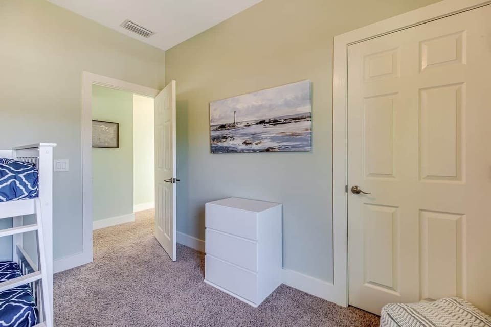 Comfortable bunk bed room with premium bedding. Our house sleeps up to 10 people.