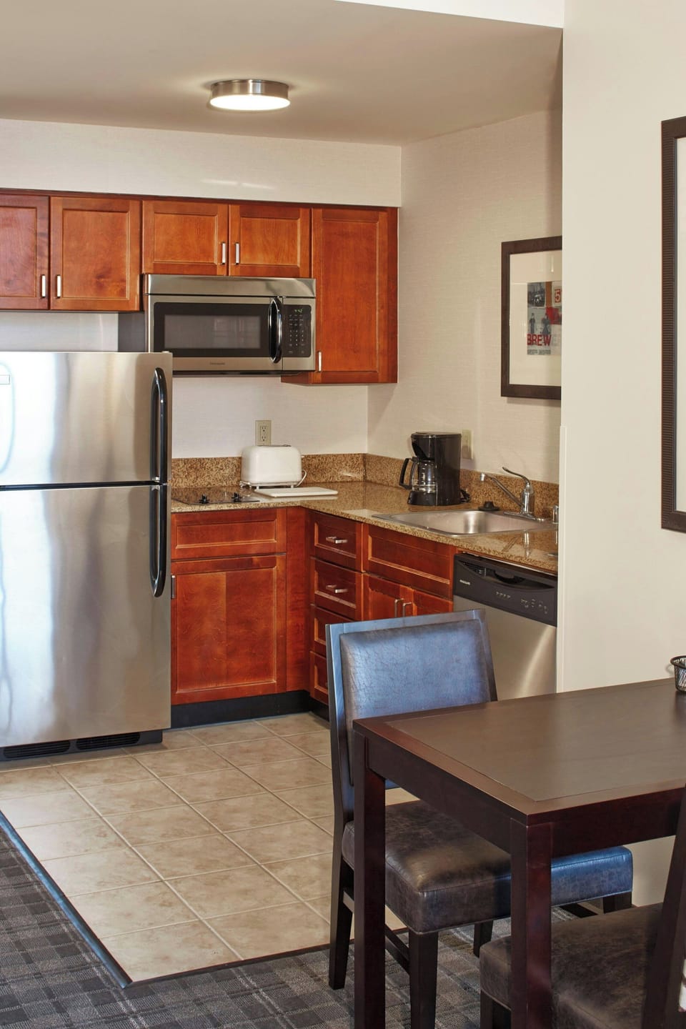 Full-size fridge, microwave, stovetop, dishwasher