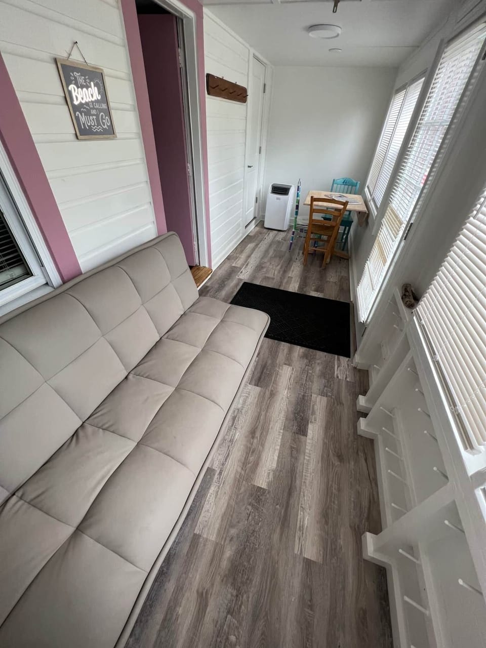 Enclosed porch with a/c and twin futon