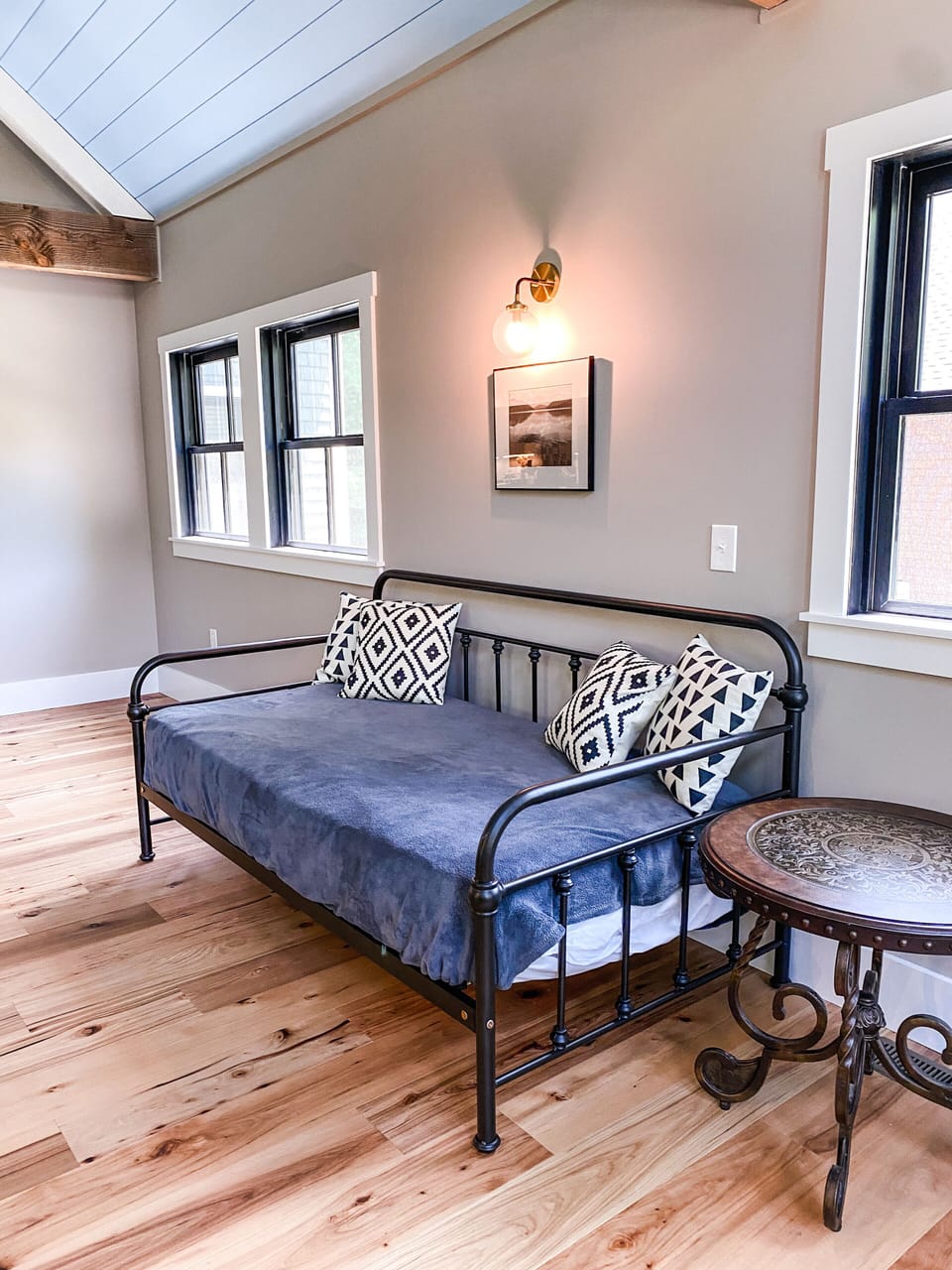 The daybed is a comfortable place to relax while having space to soak it all in.