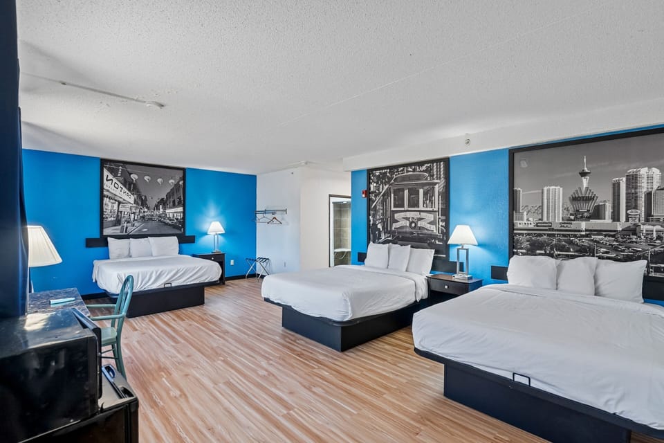 Family Room 3 Queen Beds Oversized Non Smoking  | Desk, laptop workspace, blackout drapes, iron/ironing board