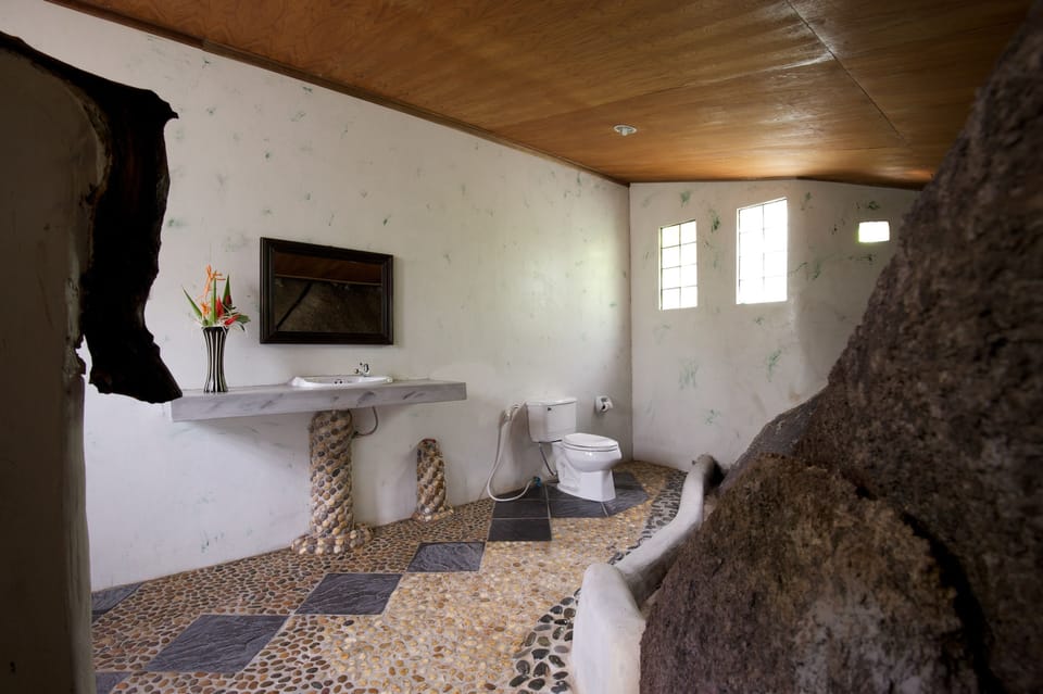 Family Garden Villa | Bathroom | Shower, rainfall showerhead, free toiletries, hair dryer
