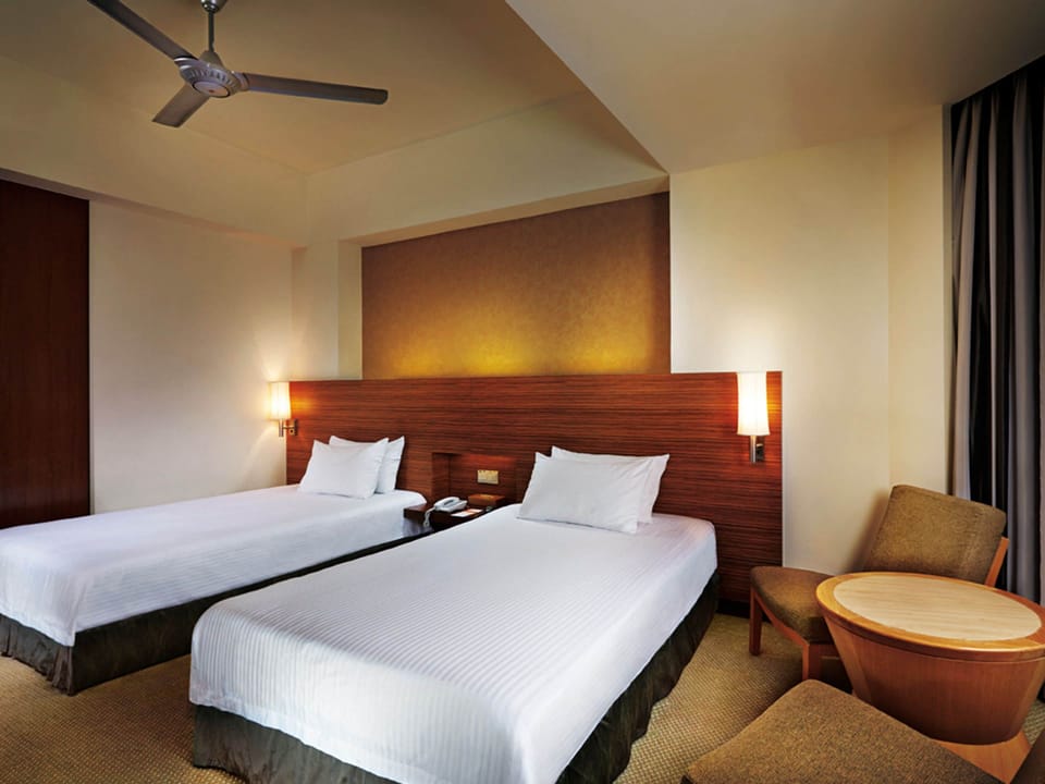 Deluxe Room | In-room safe, desk, iron/ironing board (on request), cribs (free)
