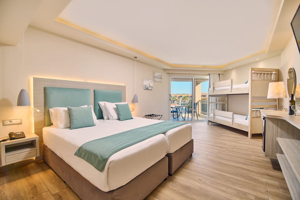 Family Room, Pool View | In-room safe, desk, iron/ironing board, free WiFi