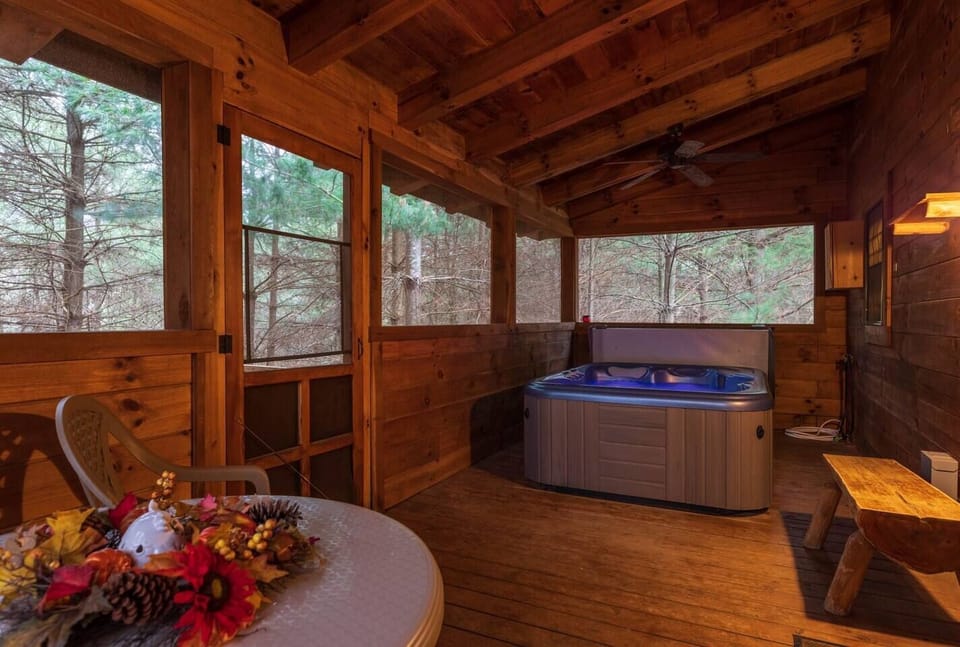 The cabin’s rear porches offer ideal spots for delicious dining under the stars or enjoying the warmth of your loved one’s presence during starry nights.