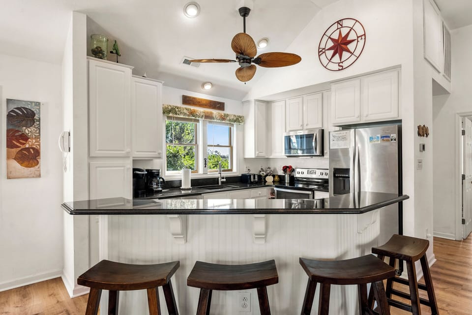 CL572: Endless Sunsets in Corolla Light l Top Level Kitchen