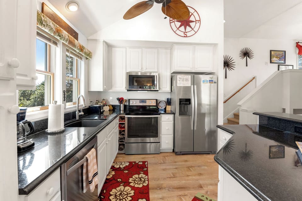 CL572: Endless Sunsets in Corolla Light l Top Level Kitchen