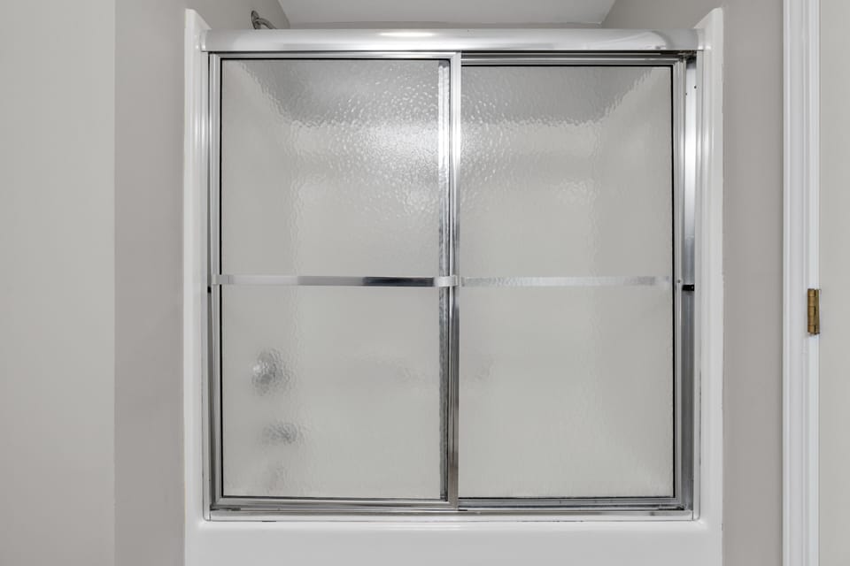 A spacious bathroom is just the place to wash away the sand.