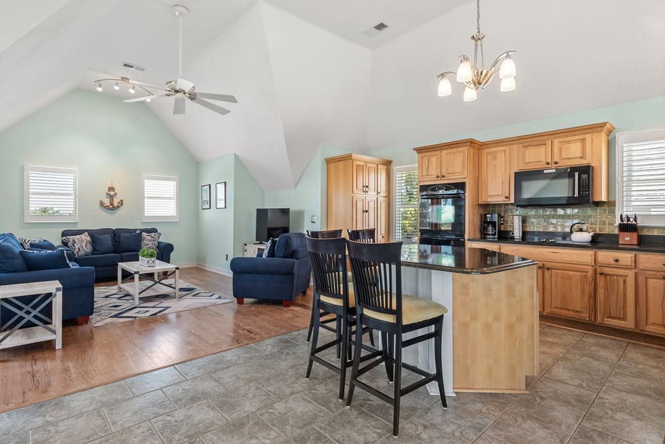 W12: Tees & Tides | Top Level Living Area and Kitchen