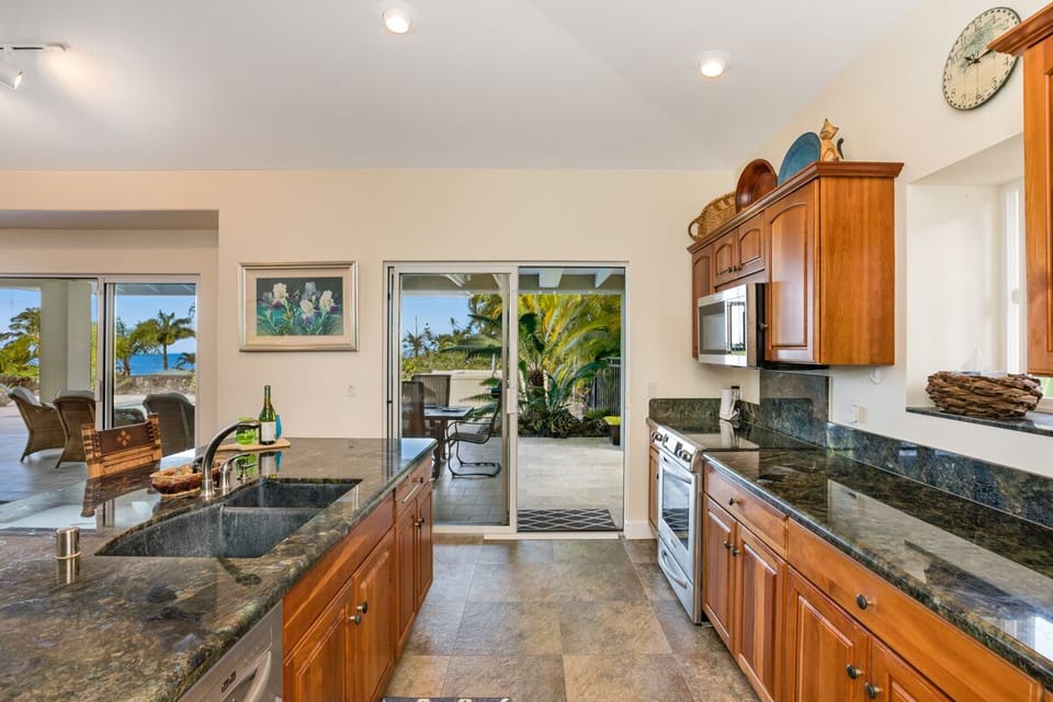 Complete Kitchen with Dining Table just outside.