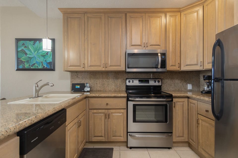 Nice cabinetry and appliances in the kitchen.
