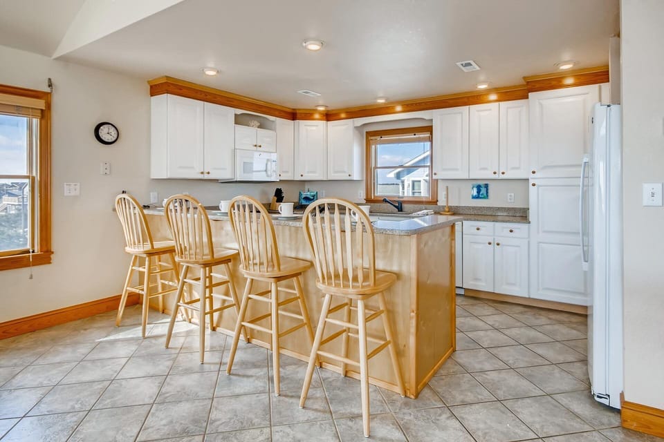 Planning and creating meals is a breeze in the well-equipped, top floor kitchen.