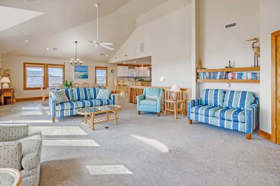 A flowing floor plan seamlessly blends the top level spaces for effortless living and entertaining.