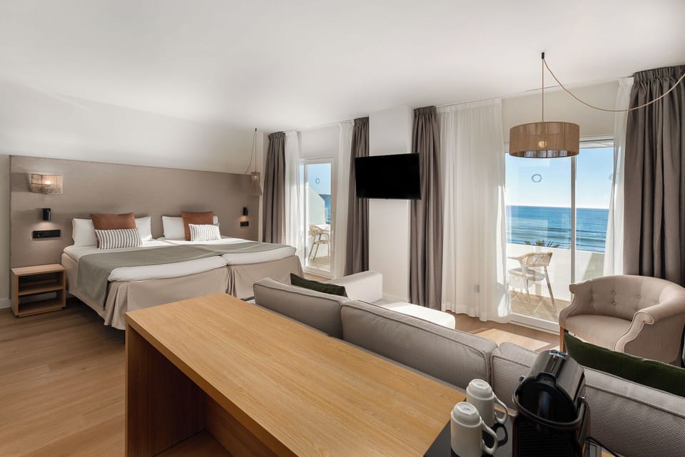Junior Suite, Balcony, Sea View | Hypo-allergenic bedding, in-room safe, free WiFi, bed sheets