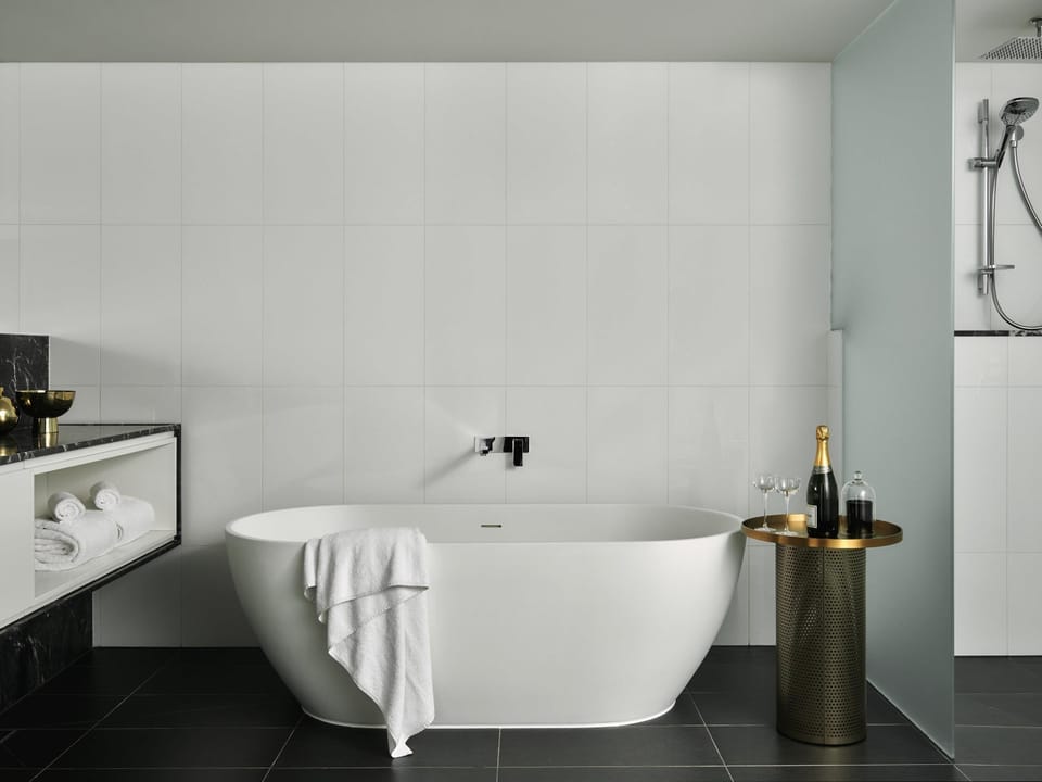 Superior Suite, 1 King Bed | Bathroom | Designer toiletries, hair dryer, bathrobes, towels