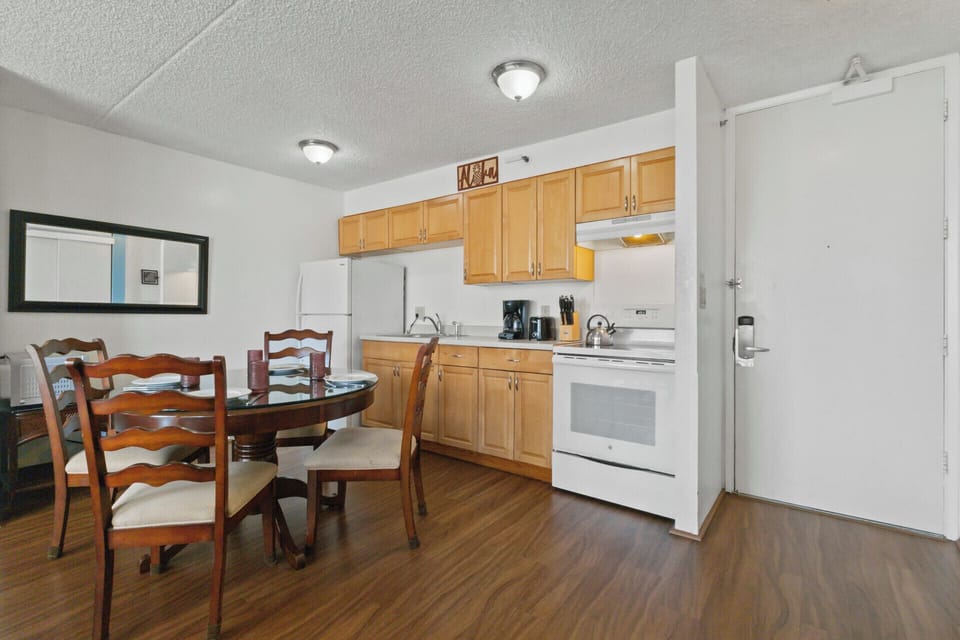 Kitchen & Dining Area - Fully-equipped kitchen with all the essentials for a seamless, extended vacation.