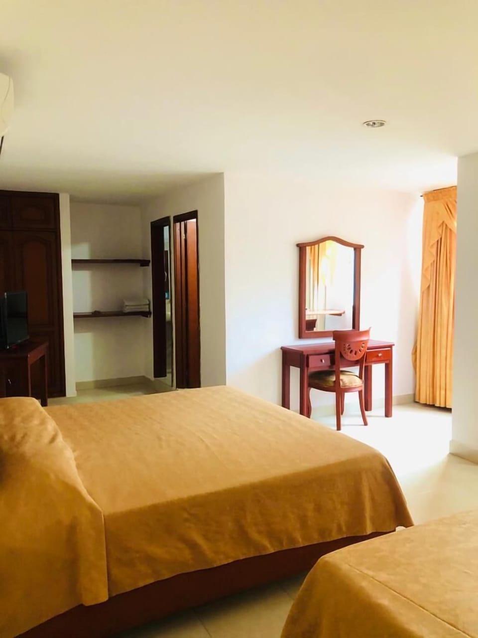 Basic Triple Room, Multiple Beds | Minibar, desk, laptop workspace, free WiFi